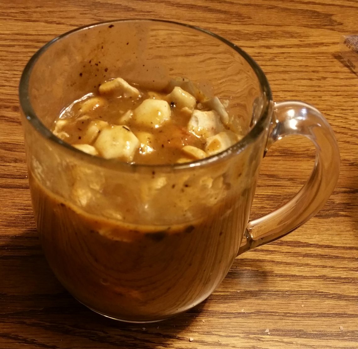 Cup of onion soup with oyster crackers