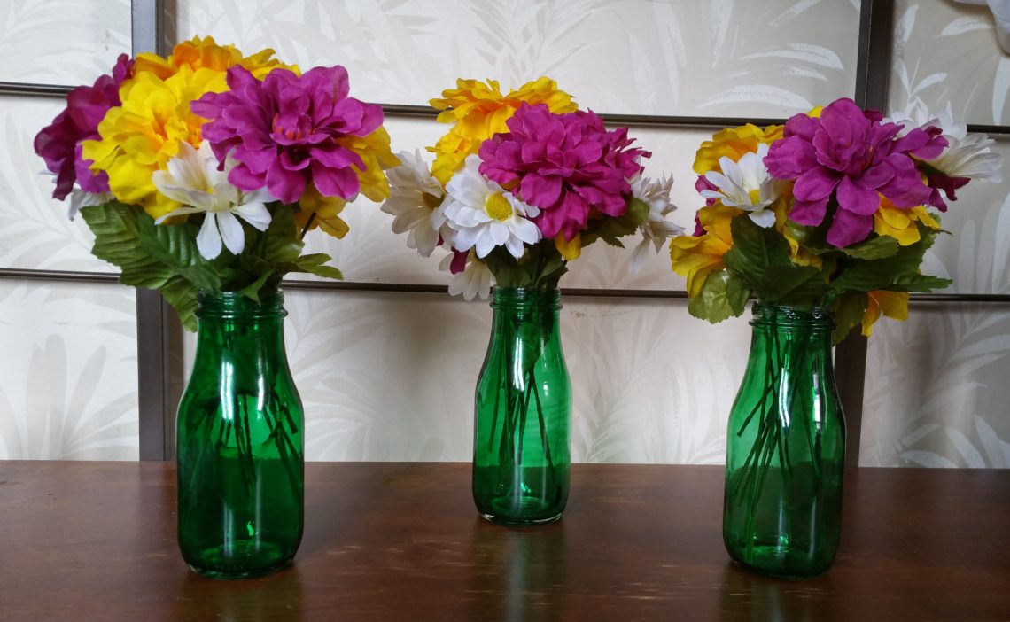 I think that the tinted bottles with the artificial flowers really turned out nicely!