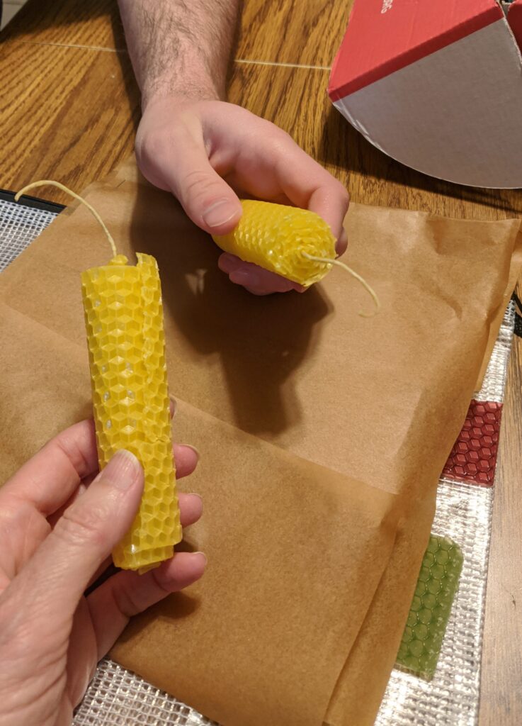 The beeswax sheets are now completely rolled up with the wick inside.