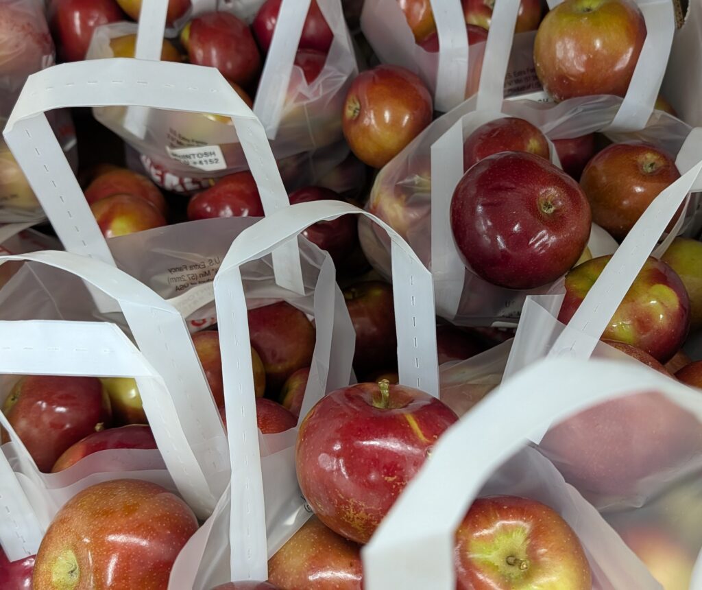 Bags of fresh apples are currently available at my local grocery store.